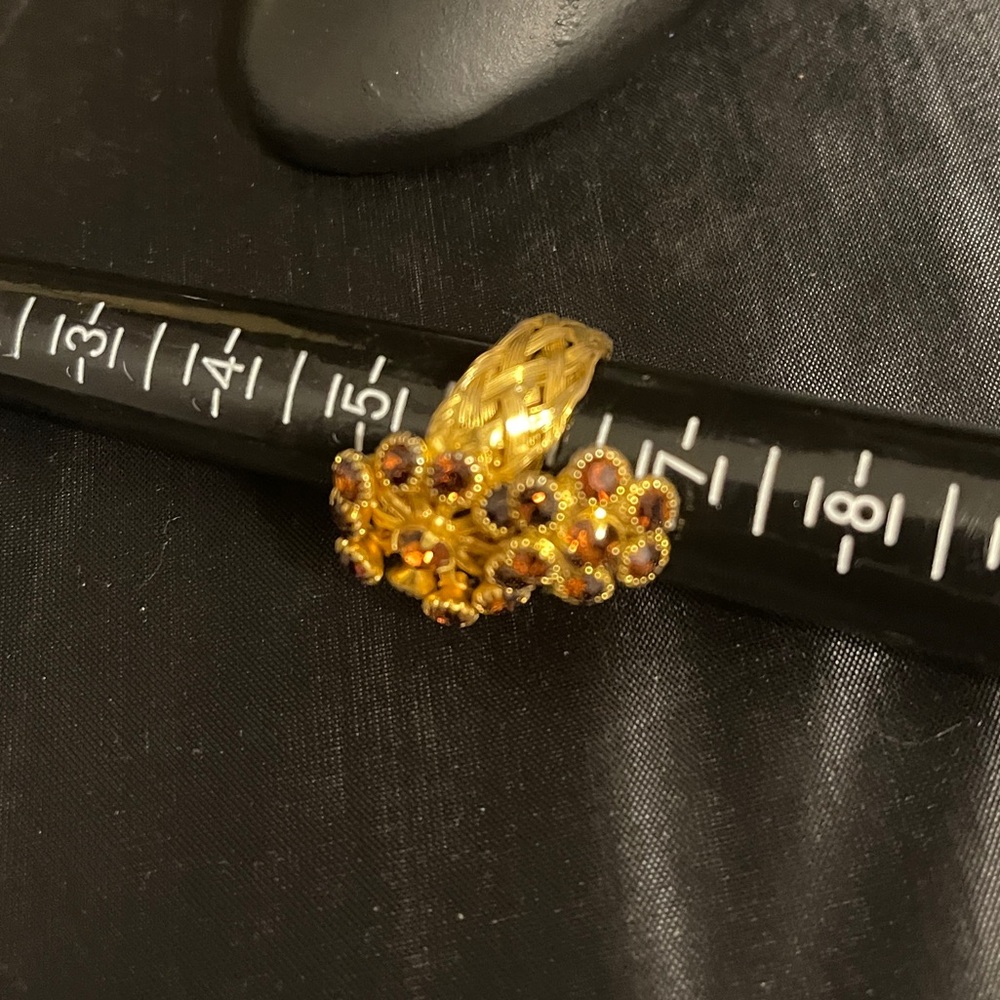 Gold tone adjustable floral ring